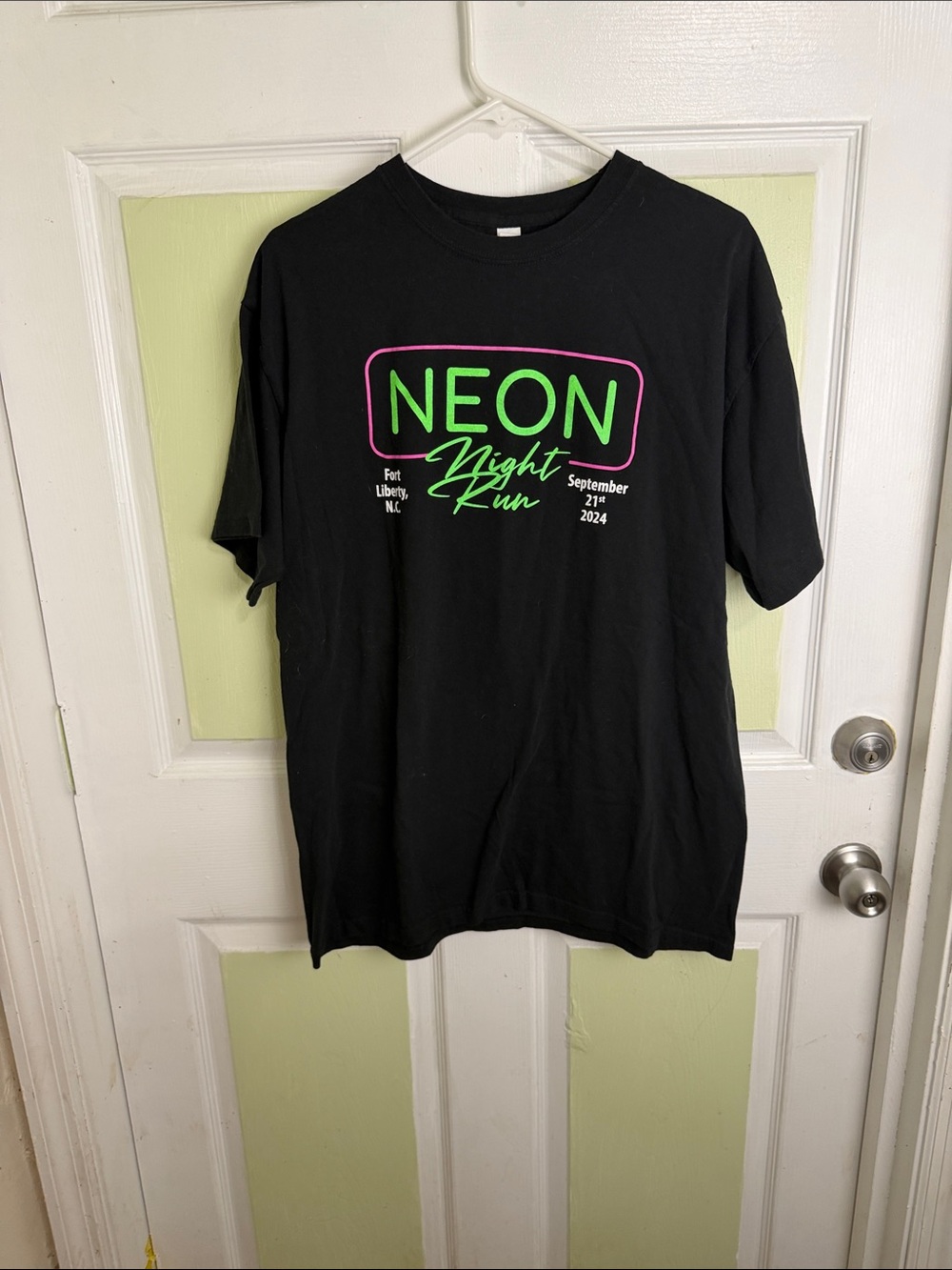 (2353) Gildan Black Short Sleeve Tee with Neon Green and Pink Graphic, Size: L